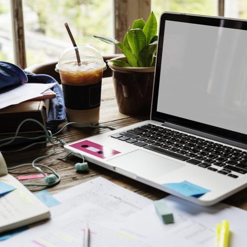 Blank screen laptop on a desk